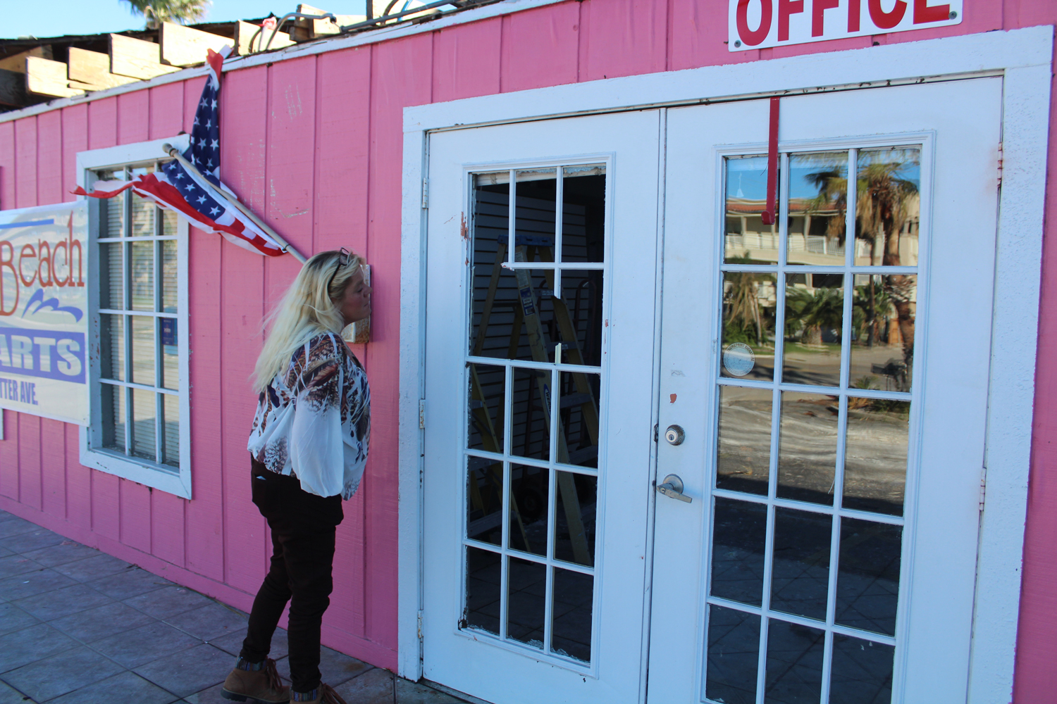 Andrea Gallegos surveys the damage of the Marina Beach RV Resort office in Port Aransas, more than three months after Hurricane Harvey damaged the building. Gallegos lives and works at the RV park. 