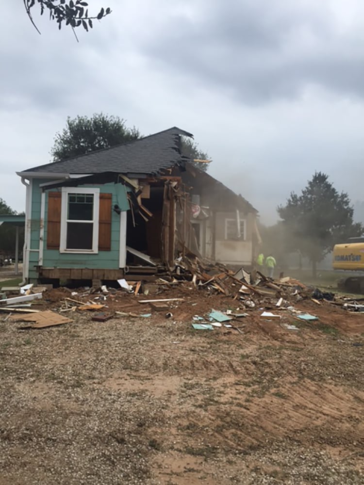 Randa Langerud's Wharton home being demolished due to damage sustained from Hurricane Harvey. Langerud's home was the first of 10 to be torn down in her neighborhood.