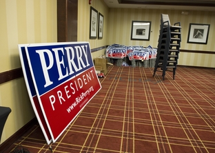 Campaign signs in a conference room at the Sheraton West Des Moines following Gov. Rick Perry's fifth-place finish in the Iowa caucuses on Jan. 3, 2012.