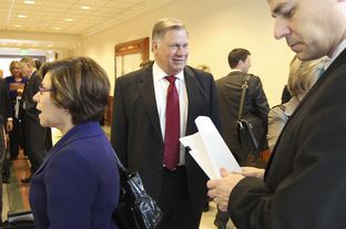 Tom Suehs waiting outside Senate committee hearing on January 31, 2011.